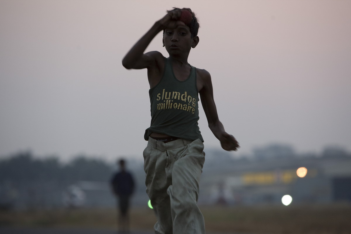 Кадры из Миллионер из трущоб (2008)